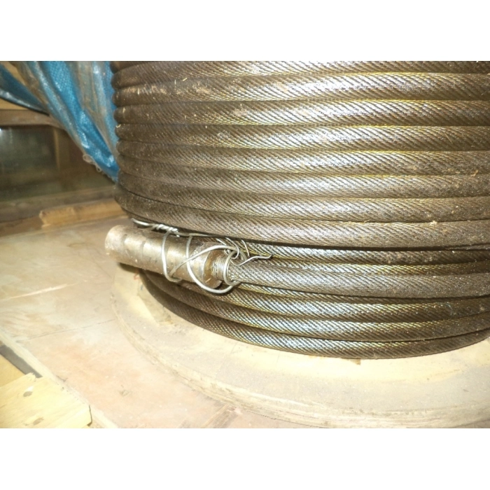 закручивается трос на автокране